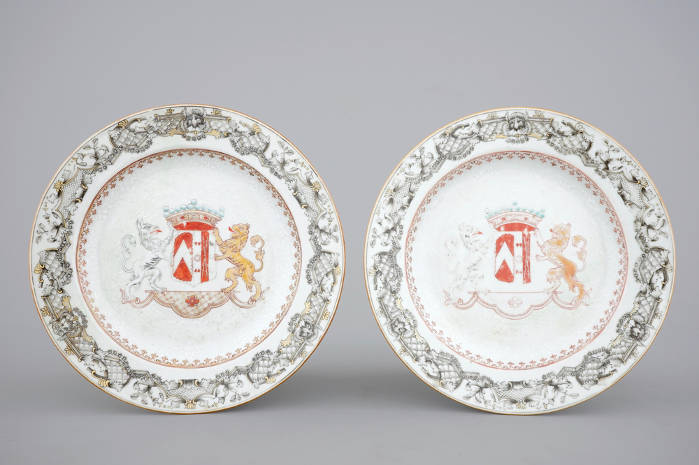 A pair of Chinese armorial export porcelain bianco sopra bianco and grisaille plates, Qianlong, 18th C.