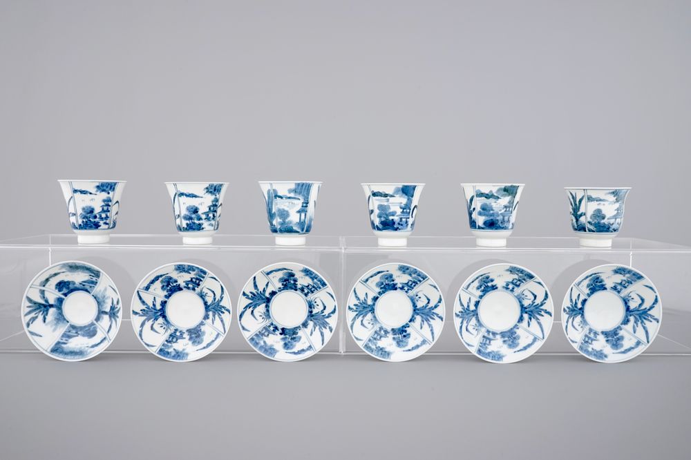 A set of six Japanese blue and white wine cups and saucers, 18/19th C.