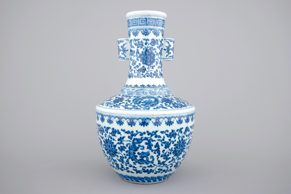 A Chinese blue and white Ming-style porcelain &quot;arrow&quot; vase with lotus scrolls, 19/20th C.