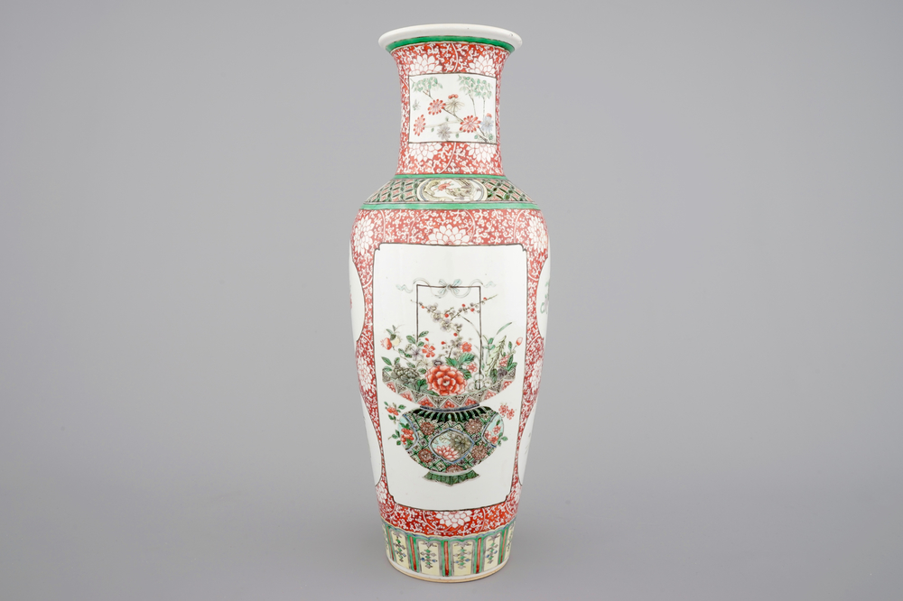 A fine Chinese famille verte and iron red porcelain vase with flowers in a basket, 19th C.