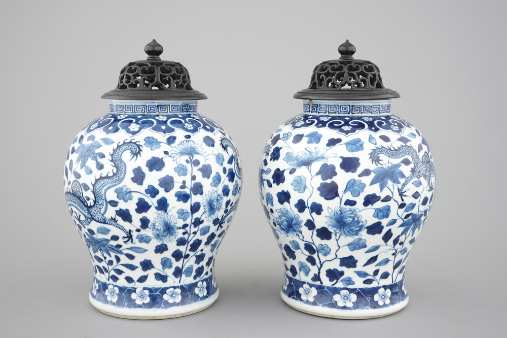 A pair of blue and white Chinese porcelain dragon vases, 19th C.