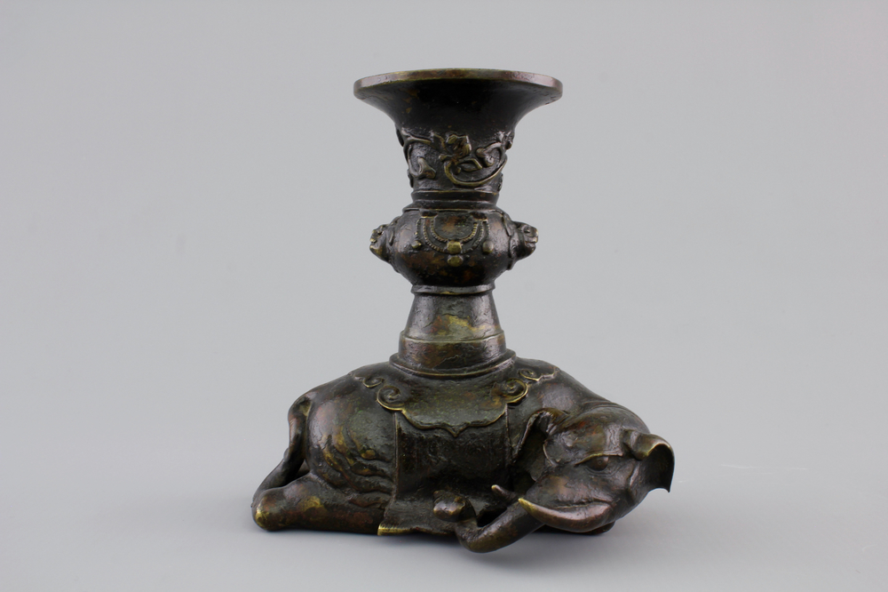 A Chinese bronze incense burner modeled as a reclining elephant, Ming Dynasty, 16/17th C.