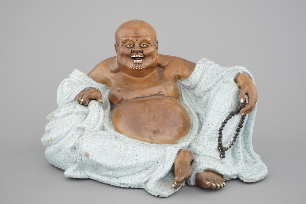 A massive Chinese signed Shiwan stoneware figure of a seated Buddha, 19/20th C.