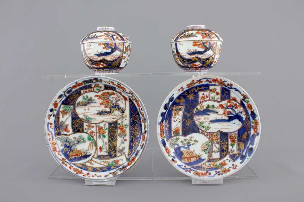 A pair of Japanese Imari porcelain cups and covers on stand, 18th C.