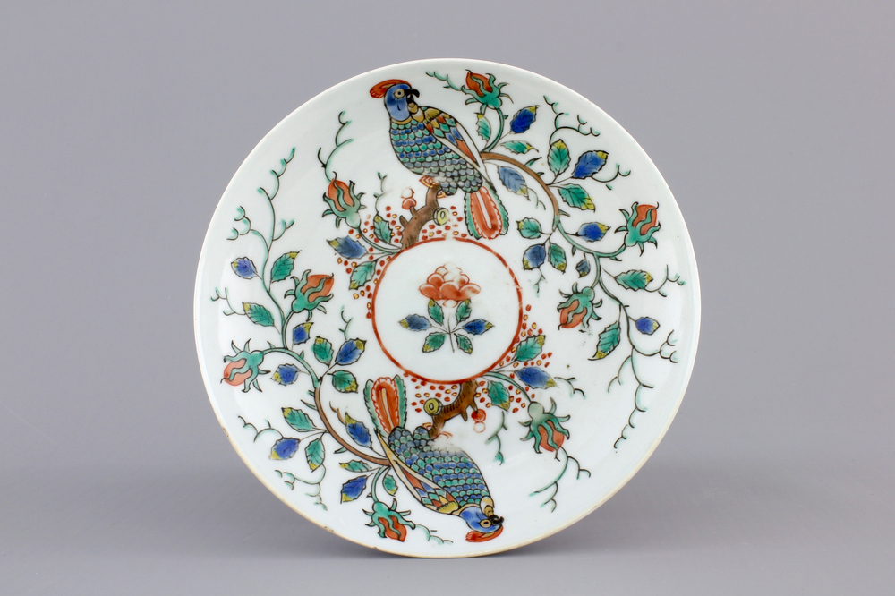 A Dutch-decorated Chinese porcelain saucer plate with parrots, 18th C.