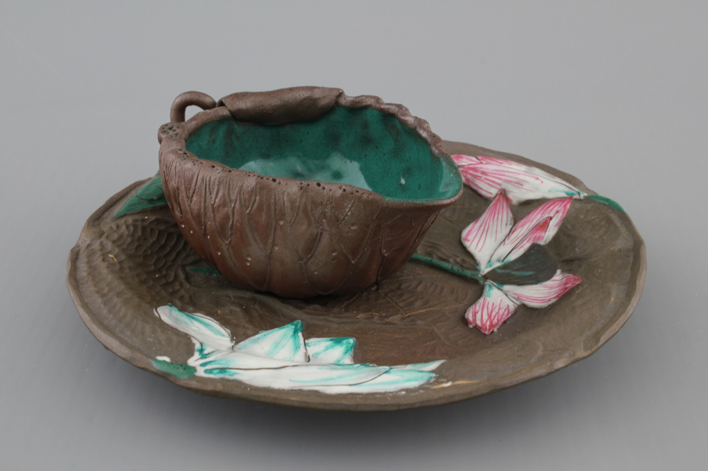 A Chinese enameled yixing stoneware cup and saucer, 19/20th C.