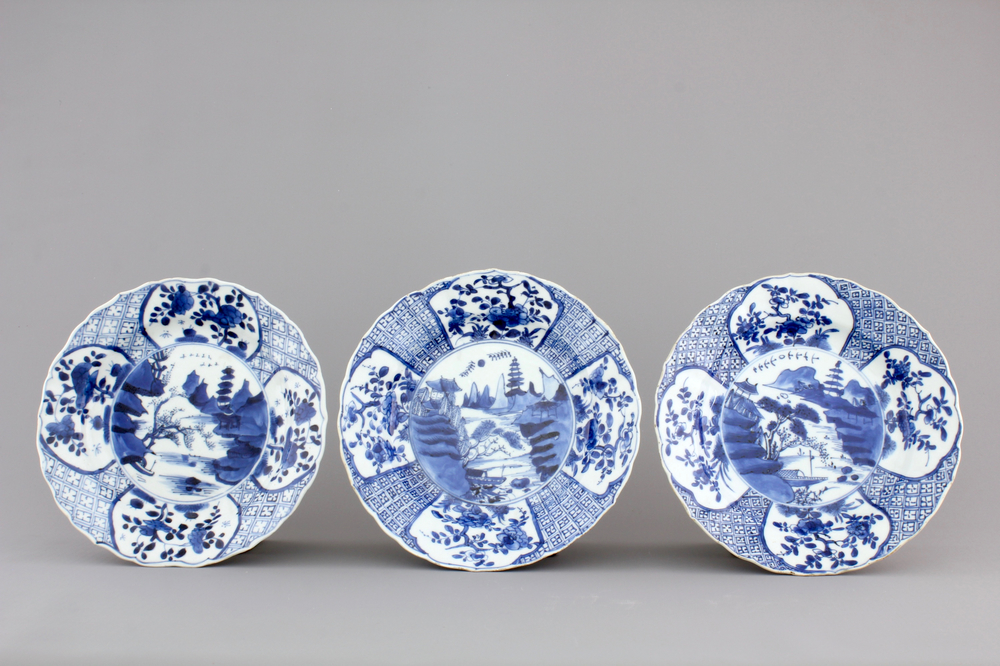 A set of three scalloped blue and white Chinese porcelain landscape plates, Kangxi, ca. 1700