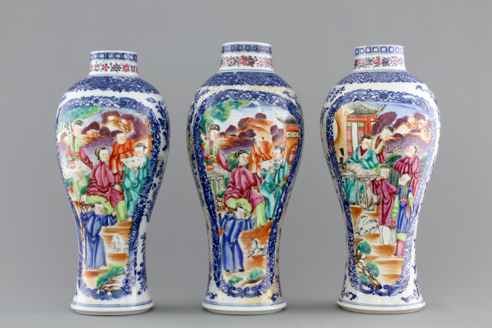 A garniture of three Chinese export porcelain Mandarin pattern vases, 18th C.