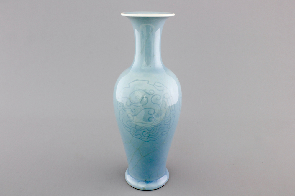 A Chinese porcelain monochrome underglaze decorated vase, 19/20th C.
