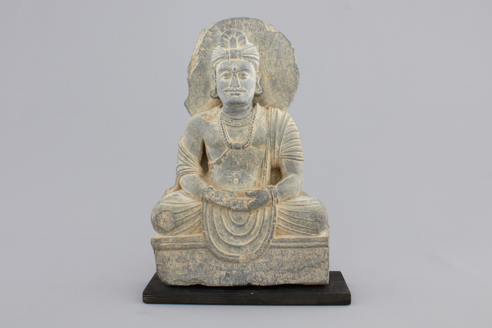 A gray schist figure of a seated Buddha, Gandhara, prob. 2nd/3rd C.