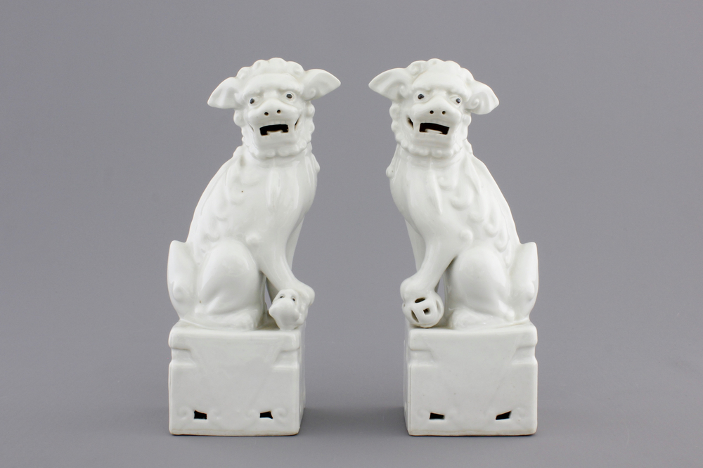 A pair of Chinese Dehua blanc de Chine figures of foo dogs or guardian lions, 19/20th