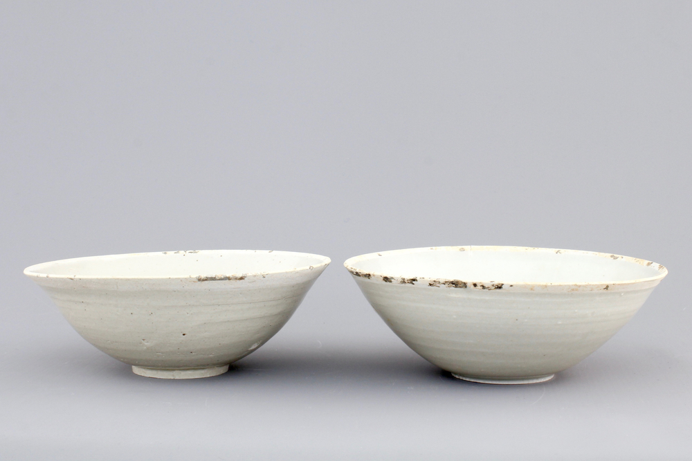 A pair of Chinese Qingbai bowls with fish, Song, 10-13th C.