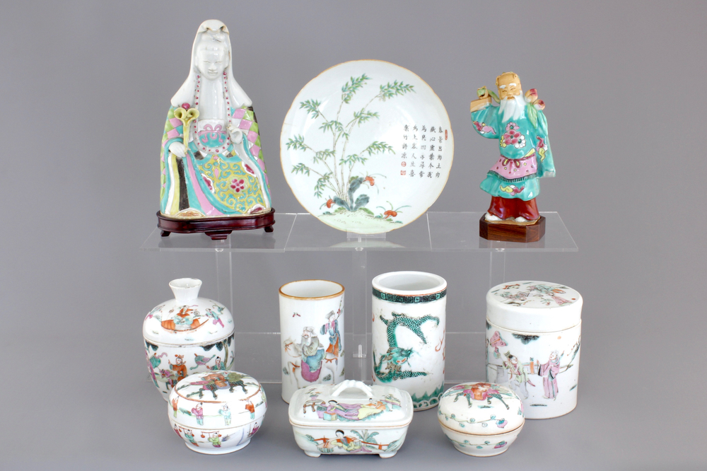 A collection of 19th century Chinese porcelain, including brush pots, figures and a poem plate