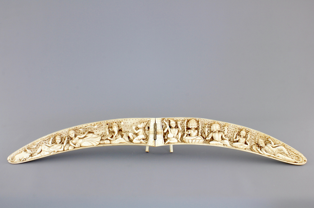 A highly unusual Indian carved open-folding ivory tusk, 19th C.