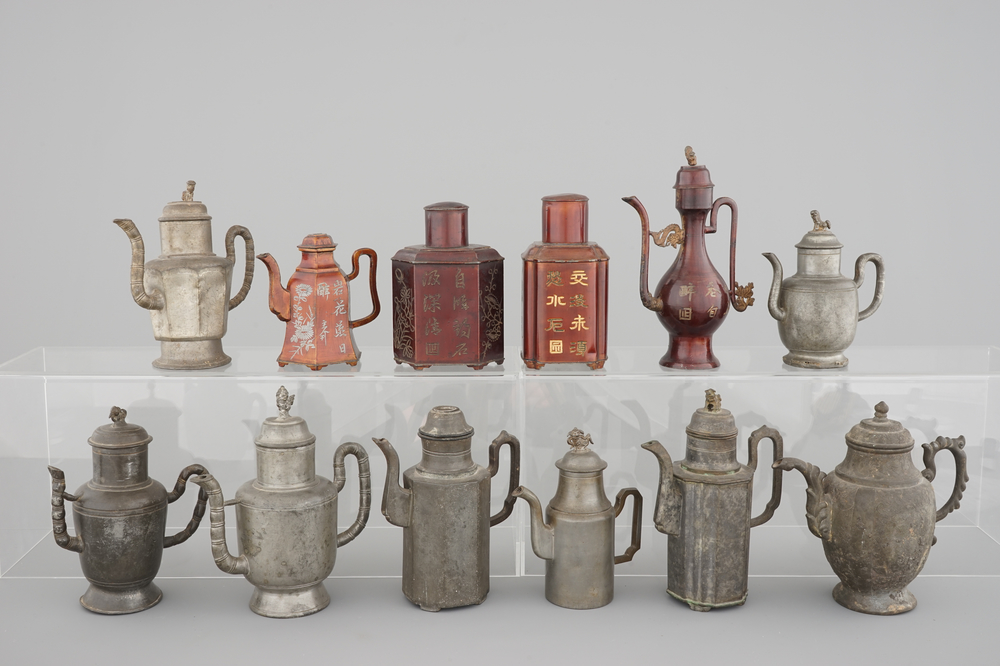 A set of 12 Chinese pewter and brass lidded jugs, tea pots and caddies, 19/20th C.