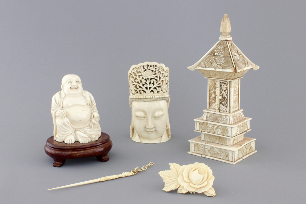 Two Chinese carved ivory figures, a hairpin and a brooch and a Japanese ivory pagoda, 19th C.