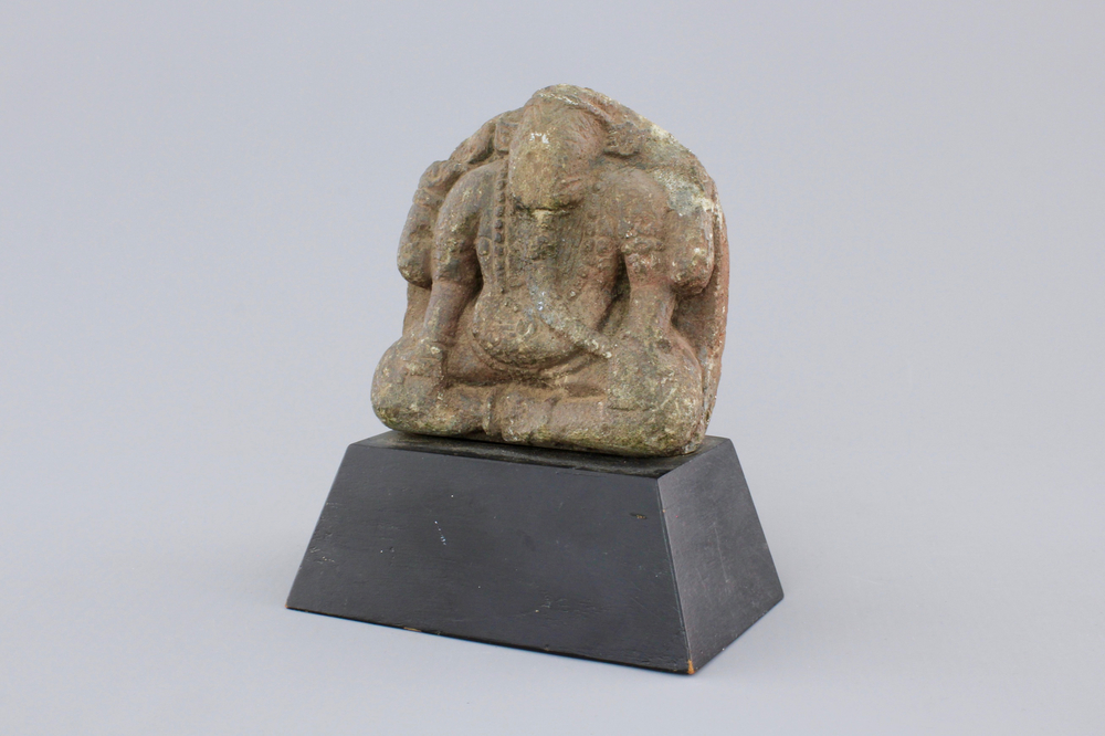 A carved stone figure of Ganesha, possibly Khmer, 12th C.