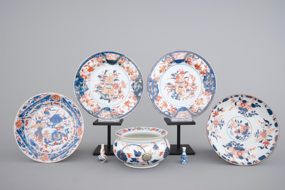 Four Chinese imari plates, two miniature vases and a bourdalou, 18th C.