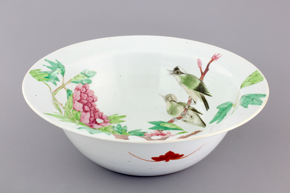 A Chinese porcelain famille rose basin with birds on a branch, 19th C.