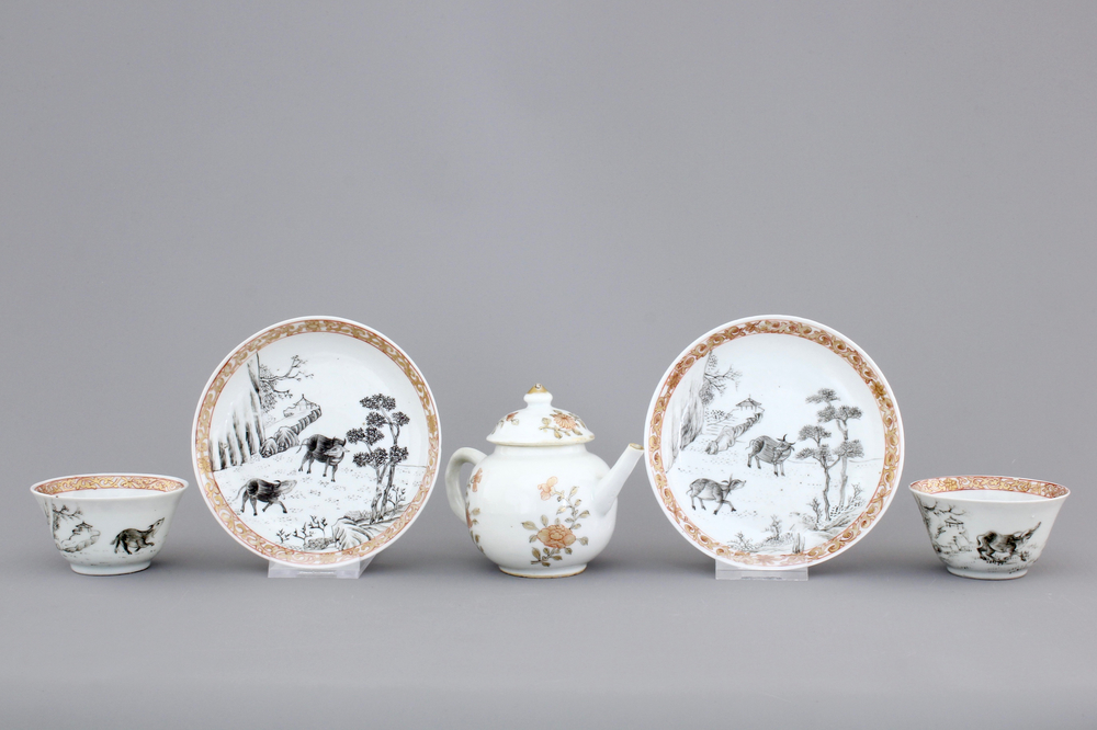 Two fine Chinese grisaille, gilt and iron-red cups and saucers and a small teapot, Yongzheng-Qianlong, 18th C.