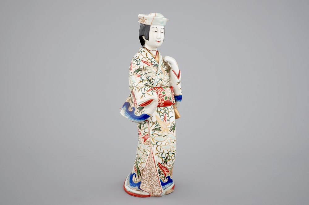 A tall Japanese Arita porcelain model of a &ldquo;courtesan&rdquo;, 17/18th C.