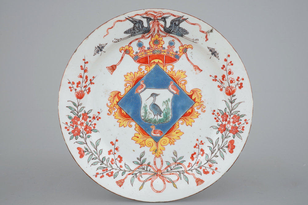 A fine Dutch-decorated armorial blanc de Chine plate, 18th C.