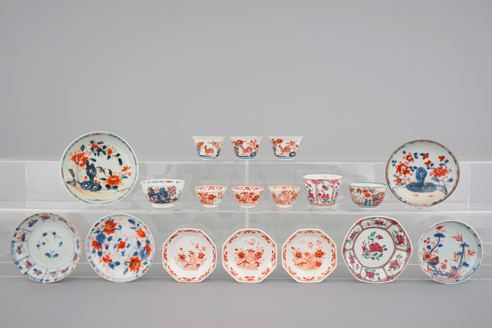 A large collection of Chinese famille rose, iron red and imari cups and saucers, 18th C.