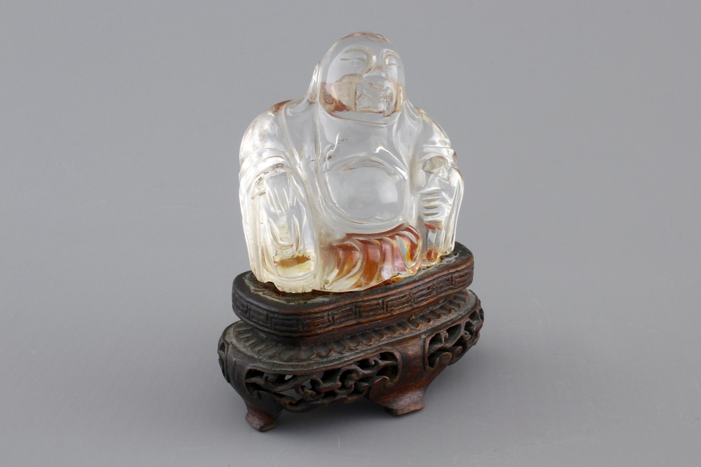 A Chinese rock crystal Buddha on stand, 18/19th C.