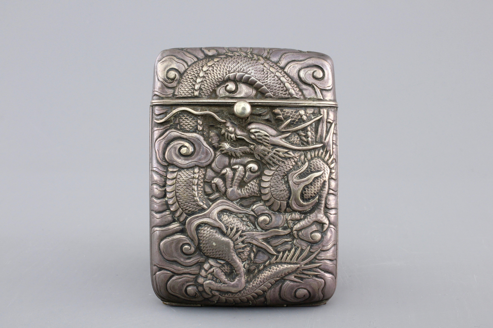 A Chinese silver cigarette case with dragons, marked, 19th C