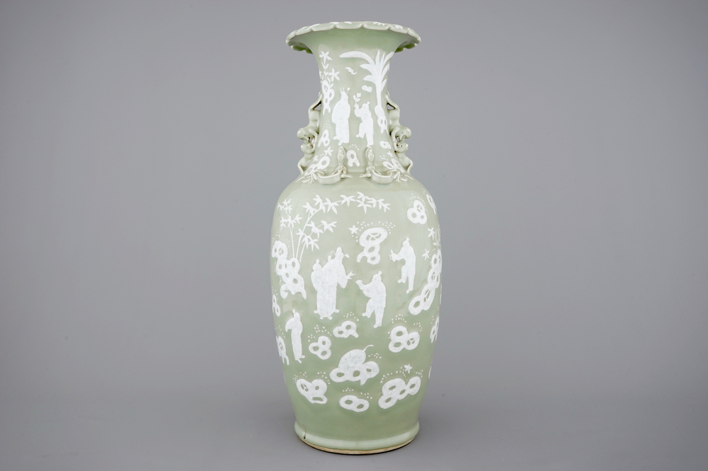 A tall Chinese porcelain white slip on celadon ground vase, 19/20th C.