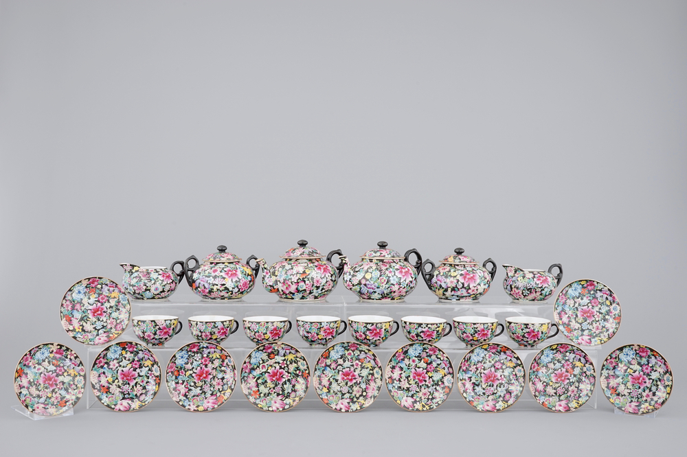 A Chinese black ground and famille rose tea service, ca. 1900, marked Qianlong