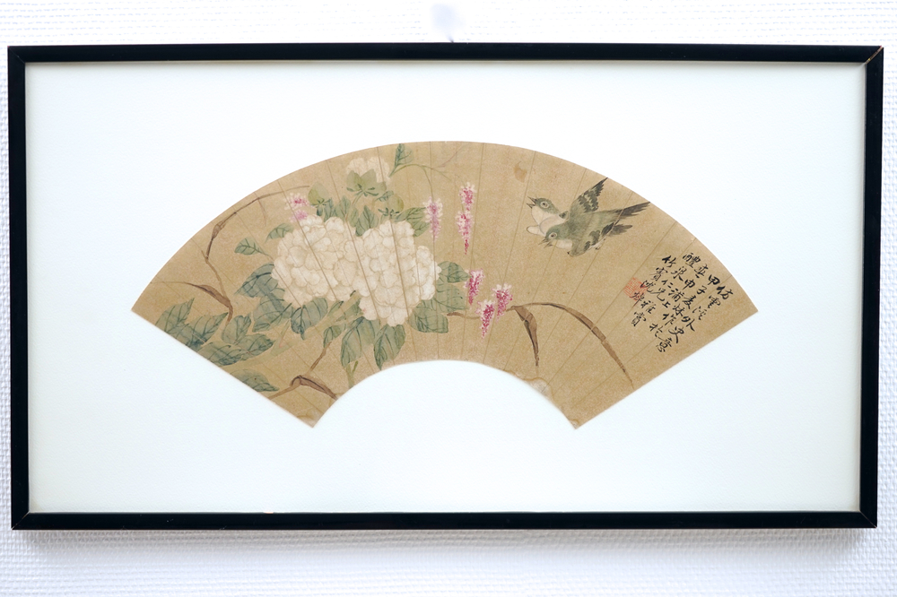 Two framed Chinese fan paintings, signed