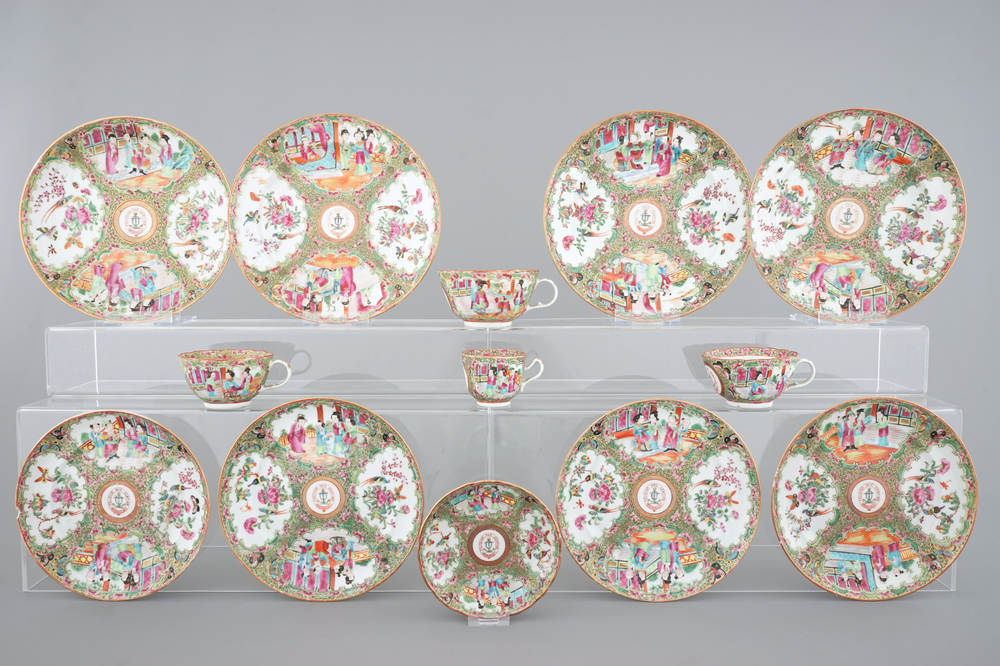 A lot of 8 Chinese Canton rose medallion armorial plates, 4 cups and a saucer, 19th C.