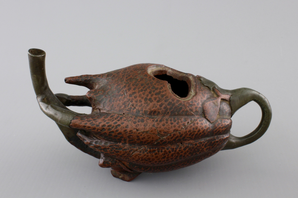 A Chinese Yixing pewter-mounted buddha's hand shaped teapot, 18/19th C.