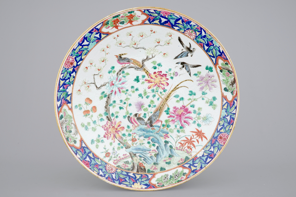 A massive Chinese Canton porcelain famille rose dish with birds, 19th C.