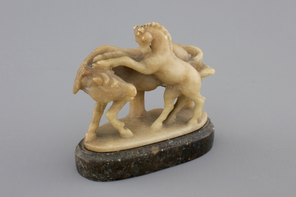 An alabaster carved figural group of horses, 18/19th C.