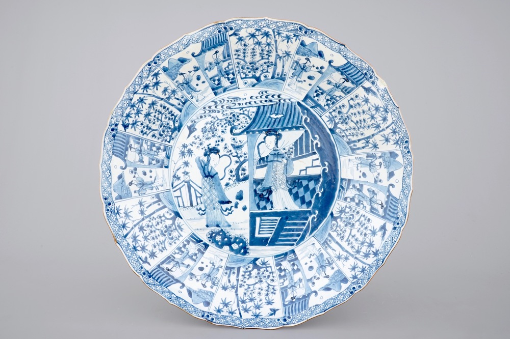 A very large blue and white Chinese dish with ladies in a garden, Kangxi, ca. 1700