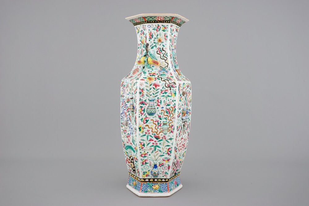 A Chinese hexagonal relief-decorated famille rose porcelain vase, 19th C.