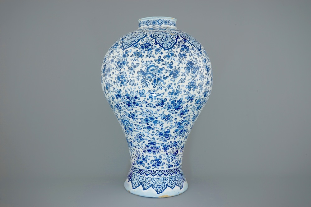 An unusually tall Dutch Delft blue and white vase with millefiori decoration, late 17th C.
