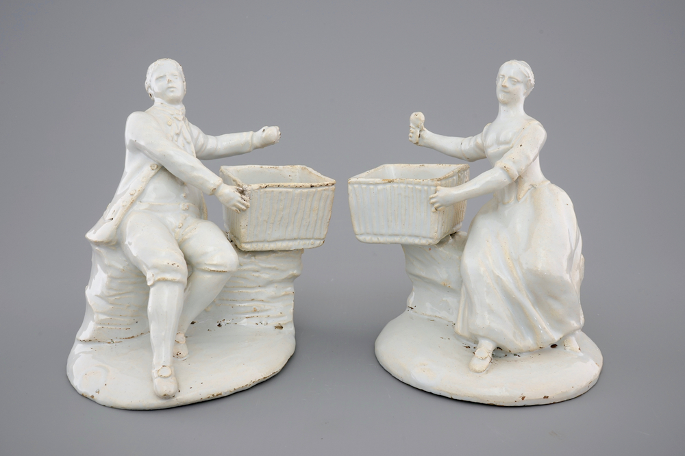 A pair of white Delft figural salts, 18th C.