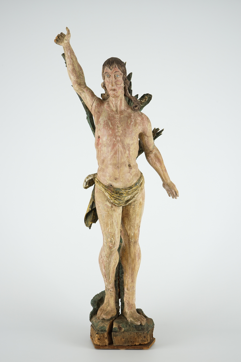 A large polychrome wood figure of Saint Sebastian, 16/17th C.