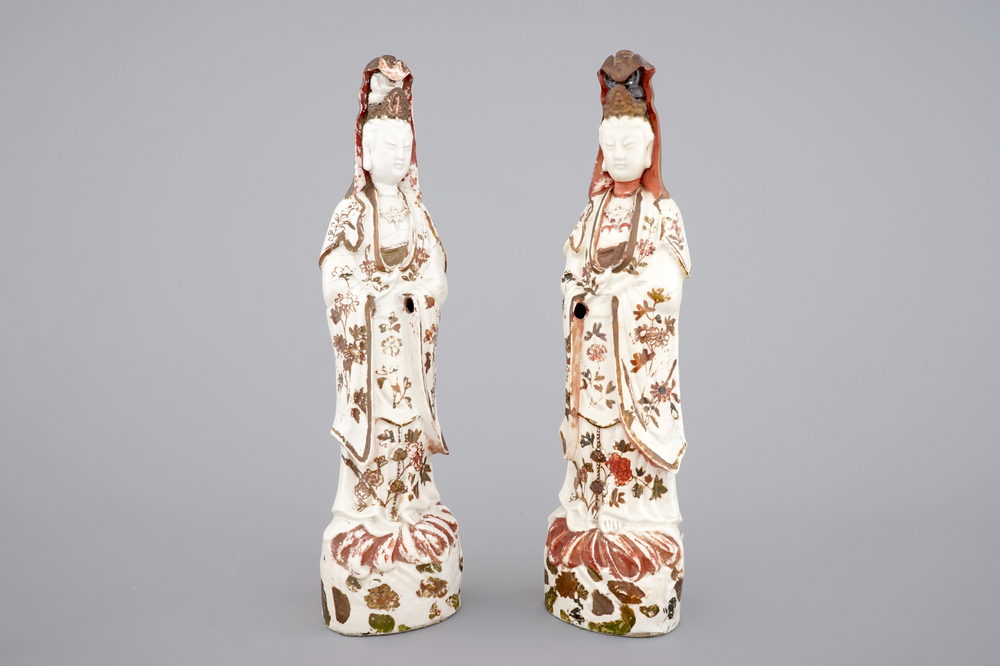 Two tall cold-painted Chinese blanc de Chine Dehua figures of Guanyin, 18th C