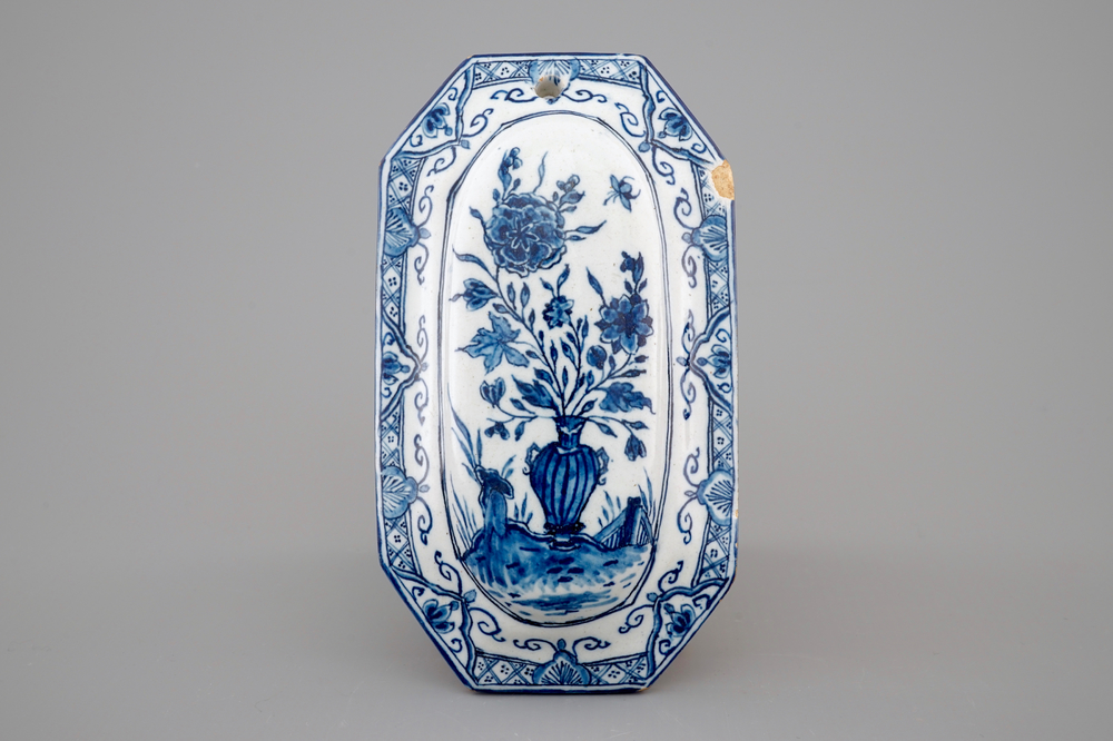 A blue and white Dutch Delft brush back, dated 1753