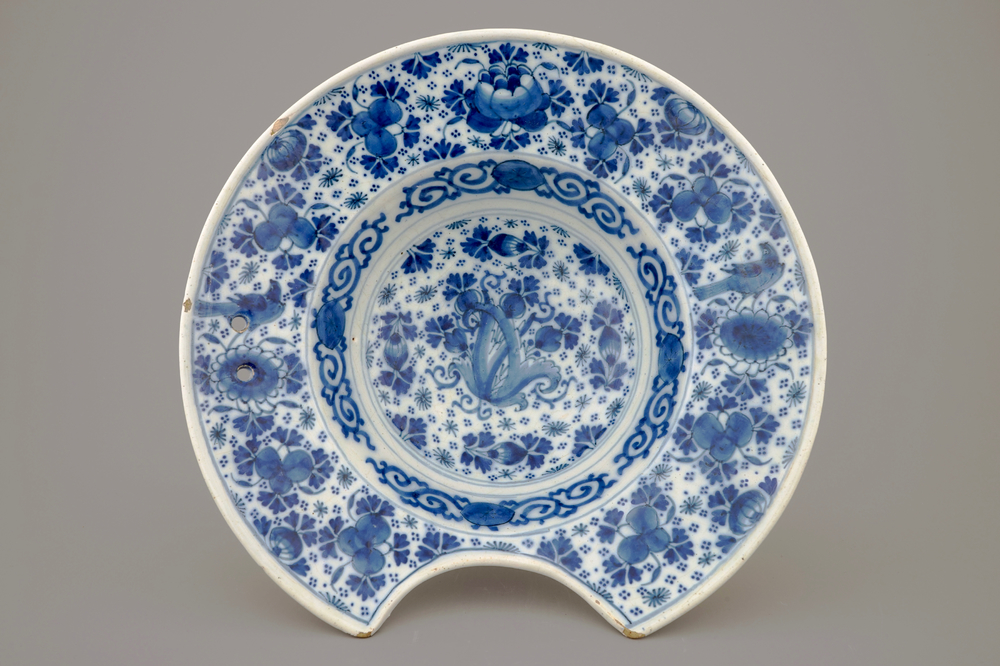 A blue and white Dutch Delft shaving bowl, early 18th C.