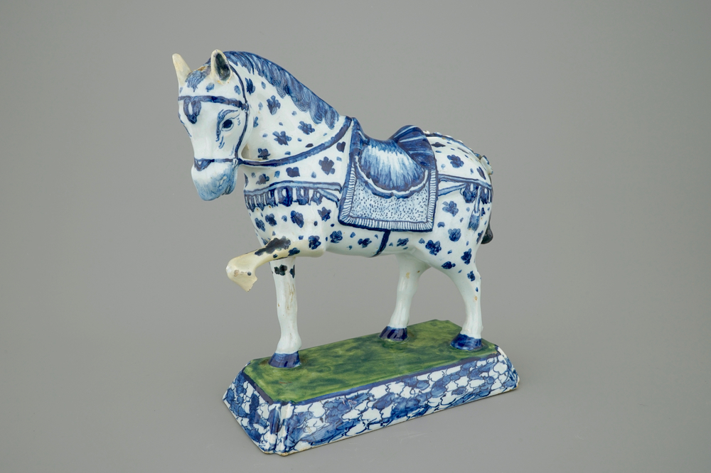 A blue and white Dutch Delft figure of a horse, 18th C.