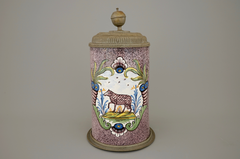 A German faience pewter-mounted beer stein with a sheep, 18th C.