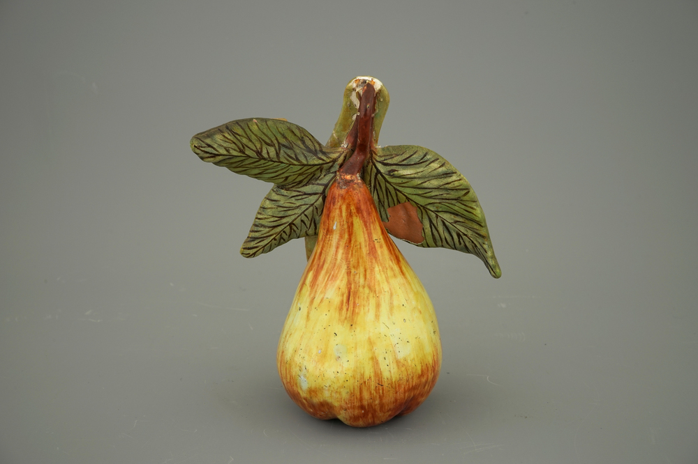 A Dutch Delft polychrome model of a pear, 18th C.