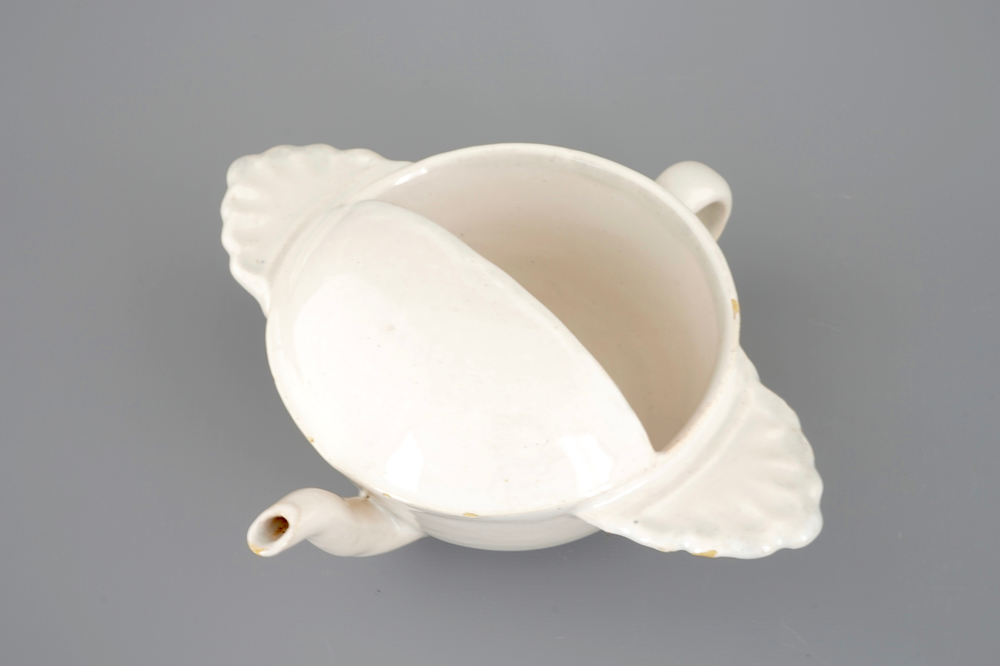 A white Dutch Delft spouted bowl, 18th C.
