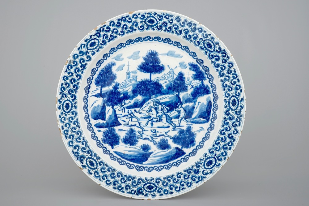 A blue and white Dutch Delft dish depicting a deer hunt, ca. 1700