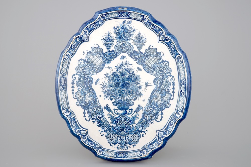A large blue and white Dutch Delft plaque with floral design, 18th C.